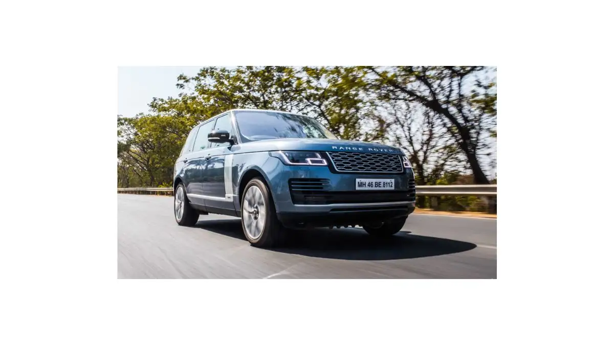 Range Rover Vogue driving on Indian highway, representing luxury lifestyle, comfort, and prestige